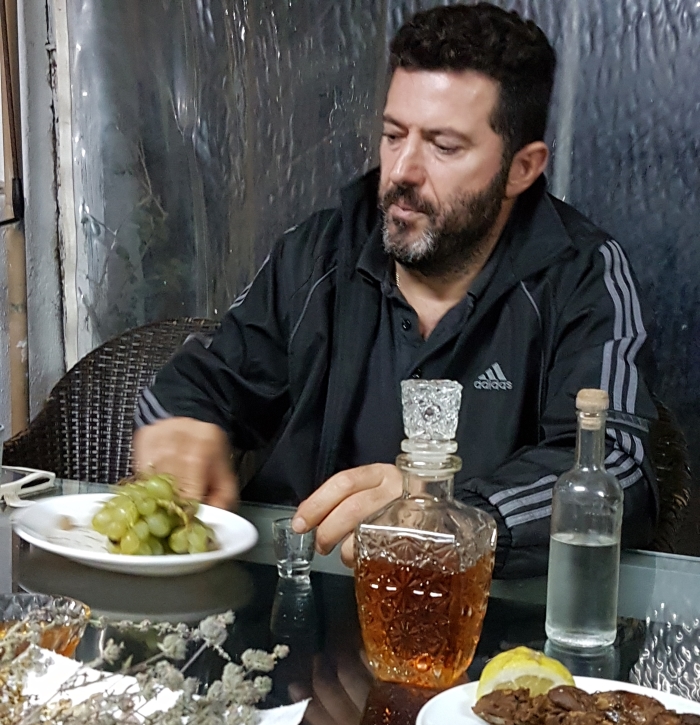 Jorgos Kourmoulis, a maker of rakomelo on Crete