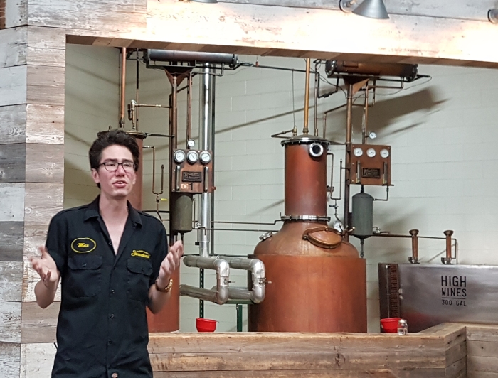 Tour guide Max Rutherford at Stranahan's Whiskey Distillery in Denver, Colorado