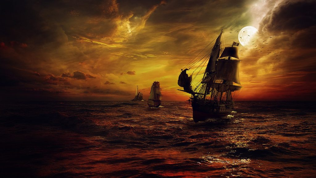 Pirate ships in a storm at sea
