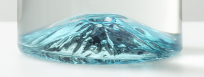 The Volcano in the Base of a bottle of Volcan de mi Tierra Blanco tequila.