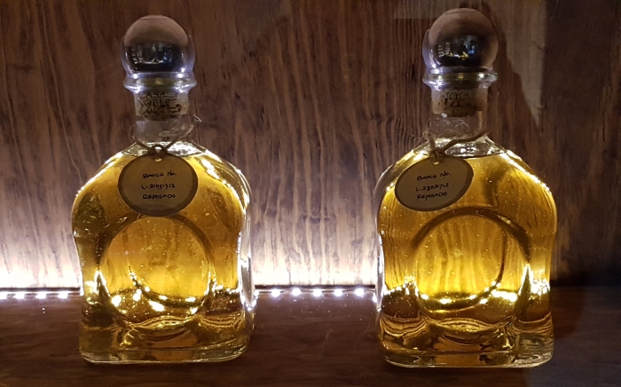 Reposado tequilas on display on a Casa Nobles tequila distillery tour