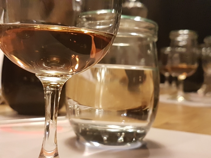 Glass of Metaxa ready for a blending session at the House of Metaxa distillery in Athens, Greece