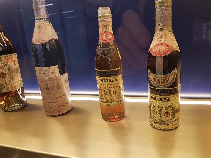 Historic old bottles of Metaxa at the distillery in Athens, Greece