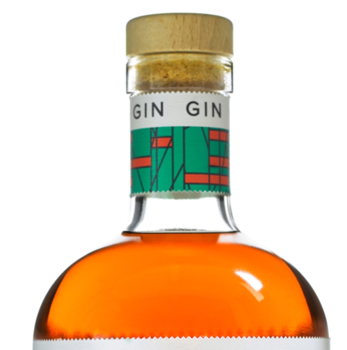 Detail from a bottle of Tommyrotter Cask strength bourbon-barrel gin