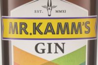 The label of a bottle of Mr Kamm's Gin being reviewed by Travel Distilled.