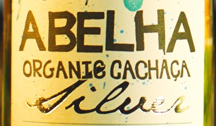 Detail from the label of a bottle of Abelha Organic Cachaca from Brazil