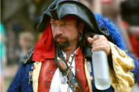 Pirate holding a bottle of rum