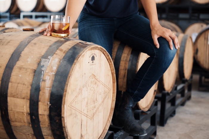 Desert Door oak-aged Texas sotol barrel and a sotol cocktail glass