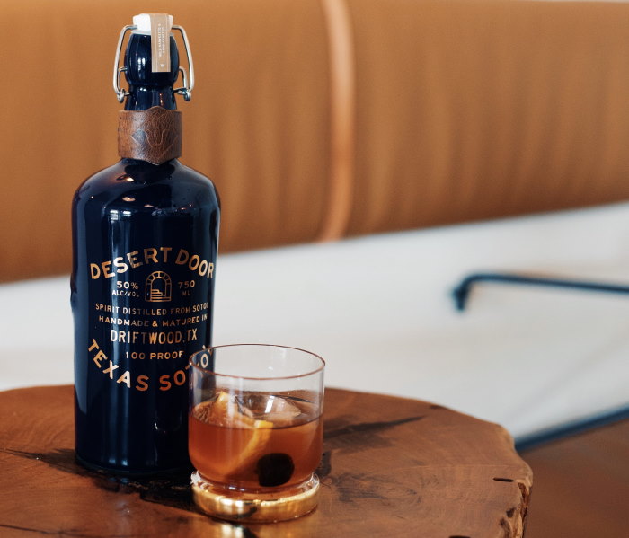 Desert Door oak-aged Texas sotol bottle and a Manhattan sotol cocktail