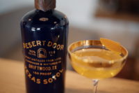 Desert Door oak-aged Texas sotol bottle and a Manhattan sotol cocktail