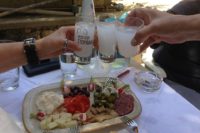 Toasting with ouzo