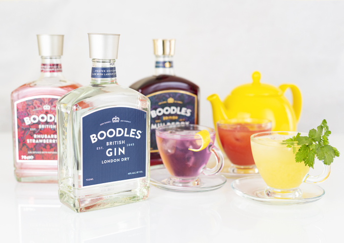 Boodles gin bottles and gin cocktails in a teapot