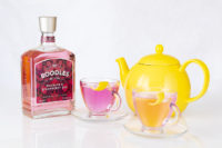 Boodles gin bottle and gin cocktails in a teapot