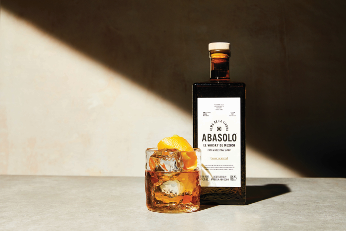 Abasolo Mexican whisky bottle and cocktail