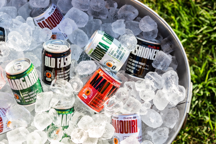 Post Meridiem Canned Cocktails Range in an ice bucket