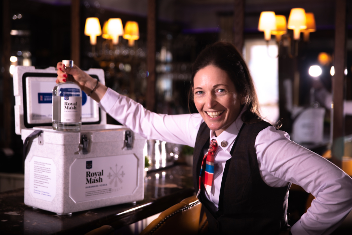 Royal Mash Vintage Vodka in a bar with a bartender