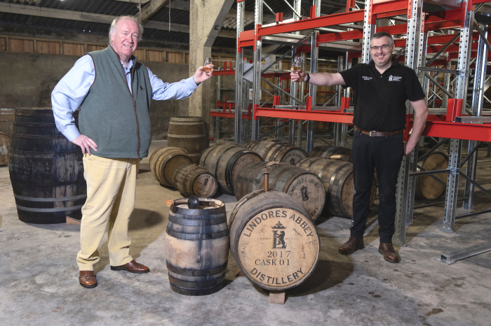 Drew McKenzie Smith, MD and Lindores Distillery Founder pictured with Gary Haggart, Distillery Manager on the maturation of the first cask of their inaugural Lindores Abbey whisky. 20 Dec 2020.