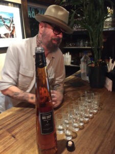 Musician Dave Stewart samples One Drop Rum aged in tequila barrels