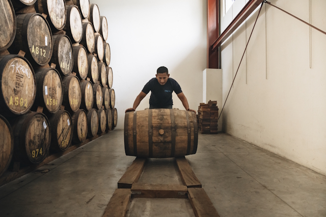 Cihuatan Alux Rum distillery rolling barrel
