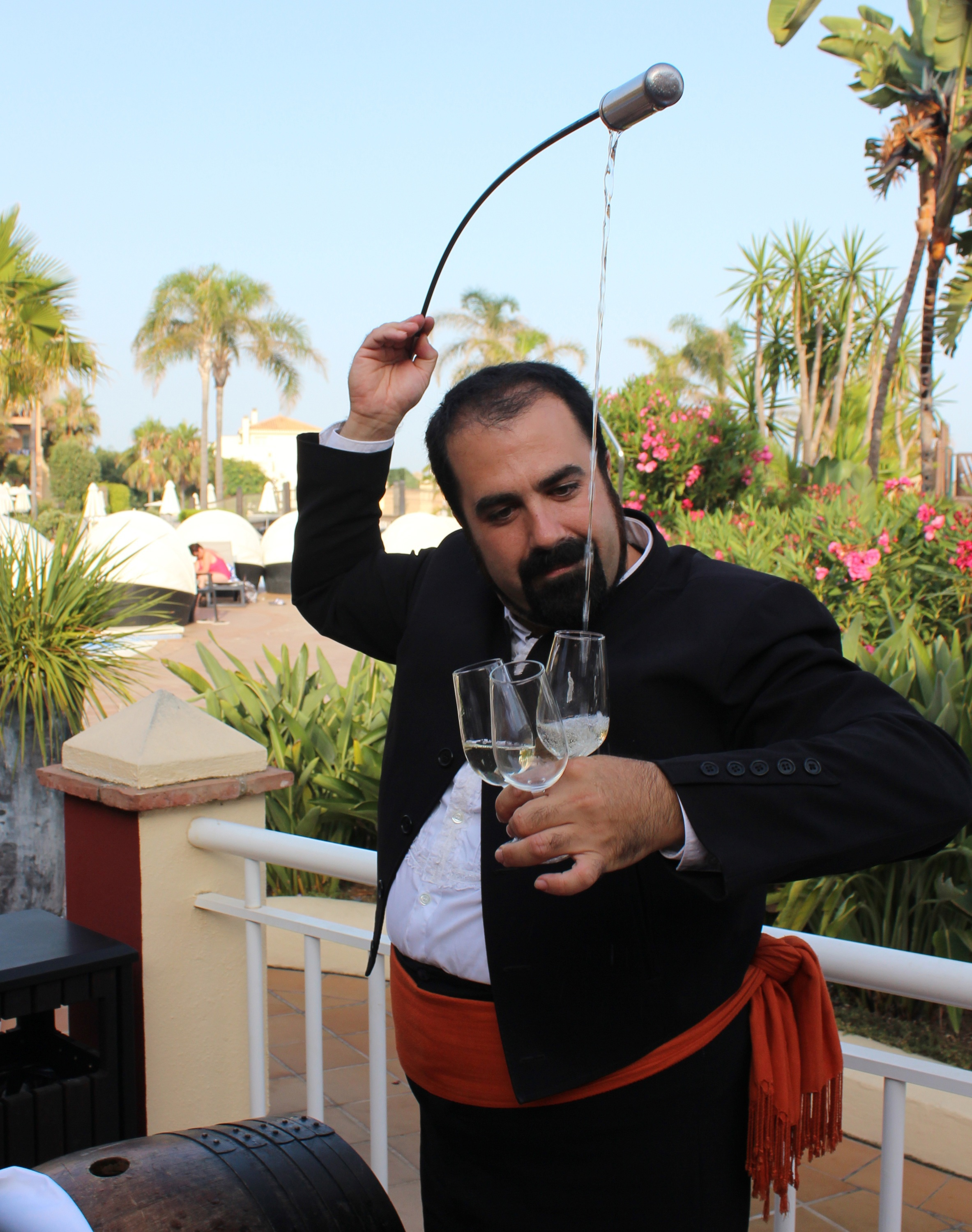 Man Pouring sherry in style