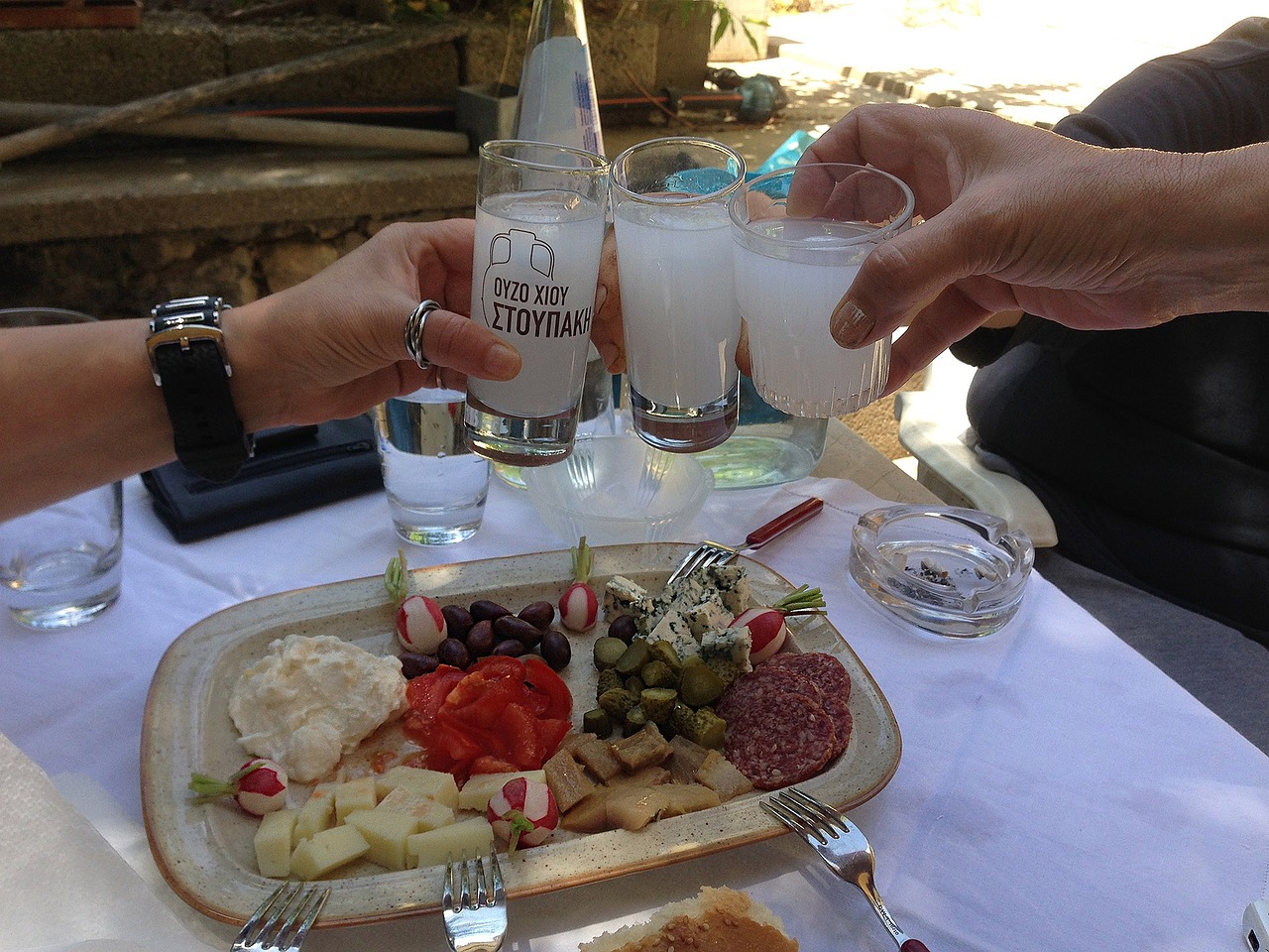 Toasting with Ouzo