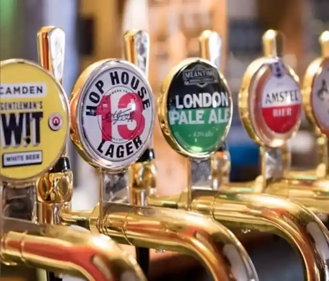 Beer pumps at Ye Olde Fighting Cocks in St Albans
