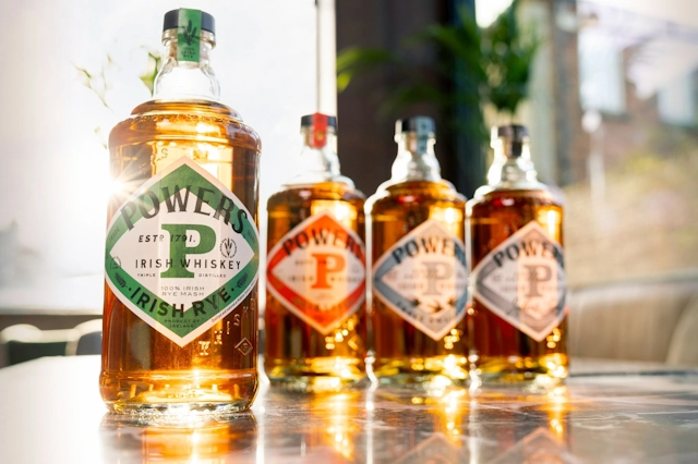 Four Bottles of Powers Irish Whiskeys